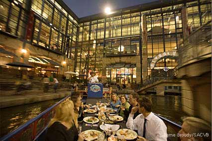 Dining on River Walk barges in San Antonio, TX