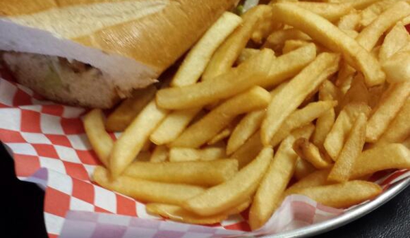 Flavors of Louisiana - Avondale, AZ. alligator po boy with fries