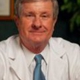 Dr. CHARLES HOLMSTEN, MD