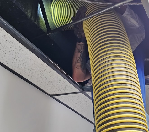 Fresh Ducts - Ogden, UT. Our technician Adam working on a commerical building