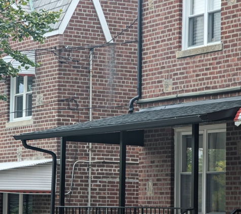 Metropolitan Awnings - Flushing, NY. Shingled porch awning