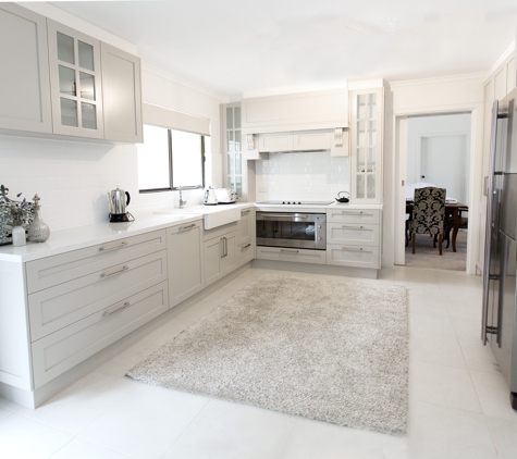 Qbic Living - Parkside, SA. Country Kitchen with stone benchtops and feature rangehood canopy
