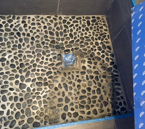 Taskmaster Construction Inc - Fort Lauderdale, FL. Discolored Stone Shower Floor