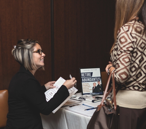 Outlook Wealth Advisors - Houston, TX. Checking in to one of the monthly retirement planning dinner seminars hosted by Outlook Wealth Advisors.