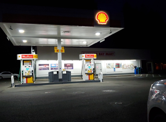 76 - Bainbridge Island, WA. New Shell fuel pumps (diesel & gasoline) in front of new facade.