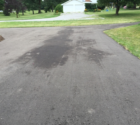 T Burkes Asphalt & Concrete Paving - Ann Arbor, MI. up by the garage! This is the day after install - the Recycled Millings take 2 days to fully dry and set.