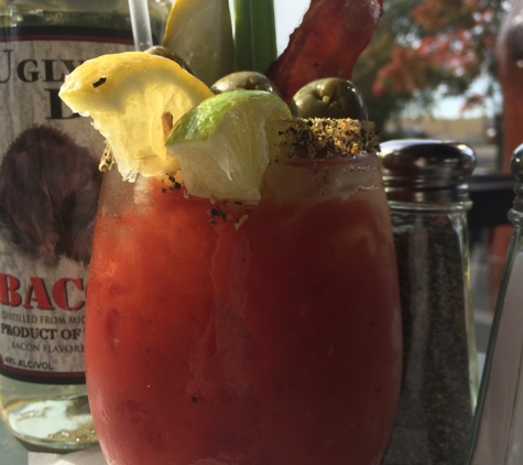 The Hunt Club - Jackson, MI. Candied Bacon Bloody Mary we had is the best ever!!