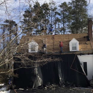 Aardvark Remodeling - Danbury, CT. Even in the snow Aardvark is still installing new roofs. Danbury Connecticut.