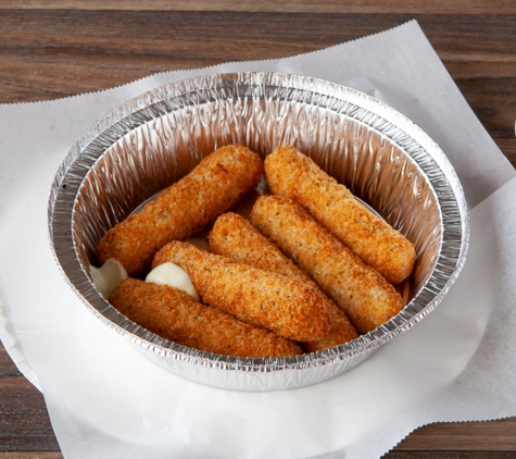 Winner's NY Pizza - Agoura Hills, CA. Stringy mozzarella sticks served with fresh homemade marinara.