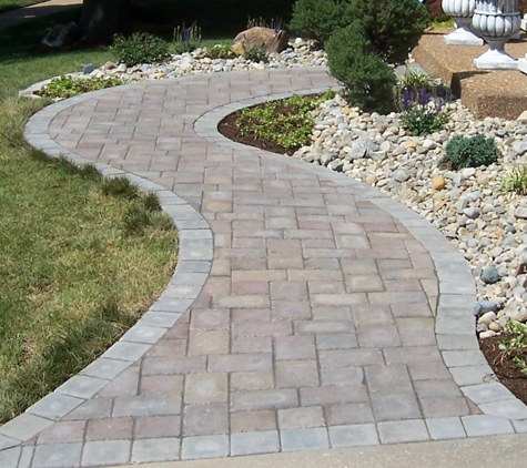 Earthscapes and Construction - Eureka, MO. Paver sidewalk with front landscaping