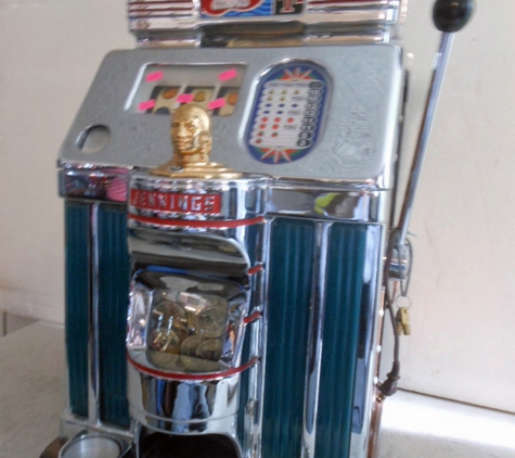 R AND H NOVELTY AND ANTIQUES AND ANTIQUE SLOT MACHINES - Reno, NV. 1965 MONTE CARLO CASIN LAS VEGAS BEAUTIFUL LIGHT UP SLOT MACHINE $1.00 DOLLAR ANTIQUE SLOT MACHINE SOLD