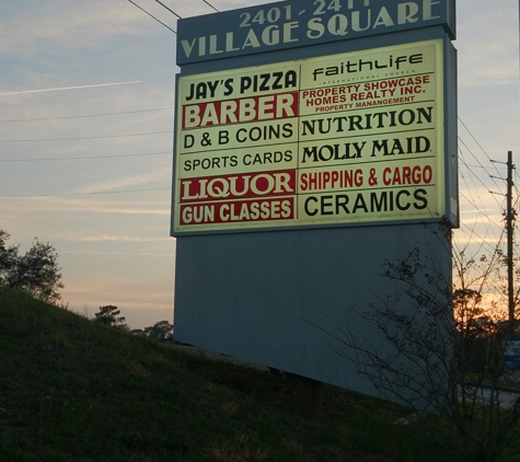 Deltona Village Barbershop in the Village Square Shopping Center - Orange City, FL