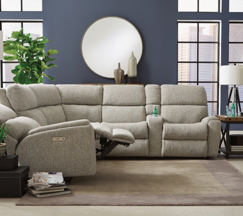 Tyndall Furniture & Mattress - Fort Mill, SC. Top rated seating for your theater room, reclining, comfortable, with special features like charging stations for your devices.