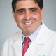 Carlos E. Reyes, MD