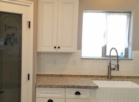 Hard Surfaces AZ - Bullhead City, AZ. 3" x 6" subway tile backsplash installed in a new construction home in Kingman