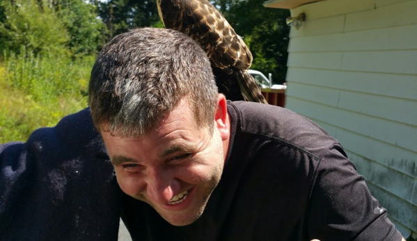 J Smegal Roofing & Renovations - Pittsfield, MA. Joe and his red tail hawk friend