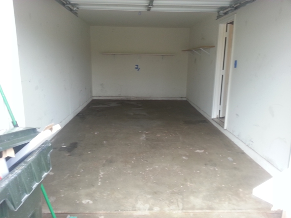Flowers Cleaning & Handyman Service. Before walls repainted and floor epoxied...