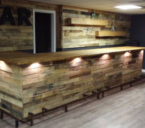 Cowboy Builds, Inc - Kennesaw, GA. 16ft pallet wood bar by Cowboy Jeff. Includes lighting and footrest.