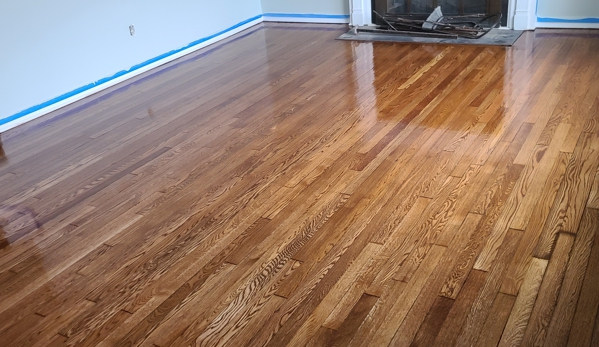 PG Hardwood Floor Refinishing - Lorain, OH. Sand and Reinished living room floor. Stained plus 3 coats of Duraseal oil based polyurethane. PG Hardwood Floor Refinishing (440)506-9220