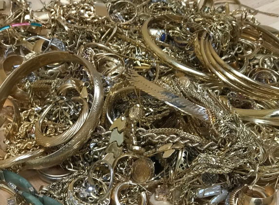 Crown Gold Exchange - Rancho Santa Margarita, CA. fine gold jewelry all karats from 10 karat, 14 karat, 18 karat and more.  This is a combination of rings, bangles, necklaces, earrings.