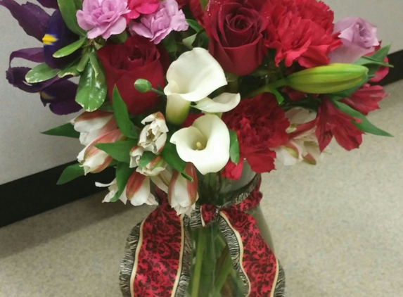 Petals & Blooms - Fort Knox, KY. Red! Flower arrangement?