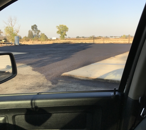 Faithful Paving - Turlock, CA. Chip seal driveway with 2 coats of oil