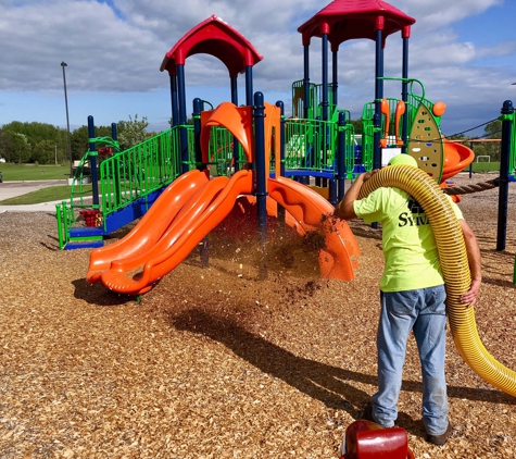 Sylva Corporation, Inc. - Princeton, MN. Blown-In installation of SoftStep® Engineered Wood Fiber.