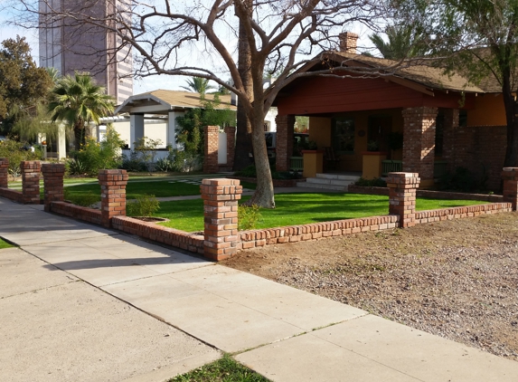 Building Block Masonry - Phoenix, AZ. Red brick columns at the front yard in the Historic district