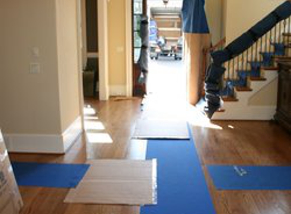 GLOBAL RE-LOCATION SERVICES DBA: AAA Family Move - Woodbridge Township, NJ. Floors Properly Covered So No Scratches Will Tear Up Wood Floors...