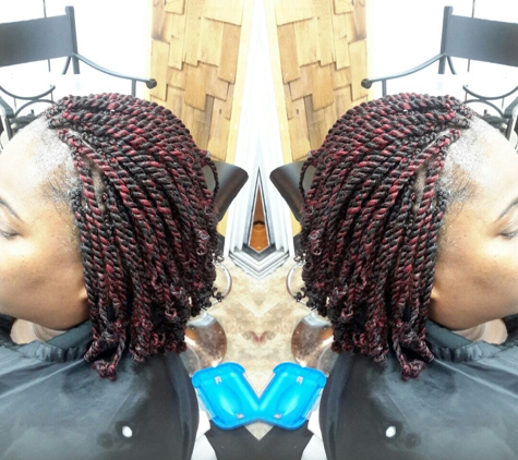 Yjire Yvette Braiding & Weaving Resolution - Saint Louis, MO. Kinki twist style from yjire Yvette Hair Braiding 