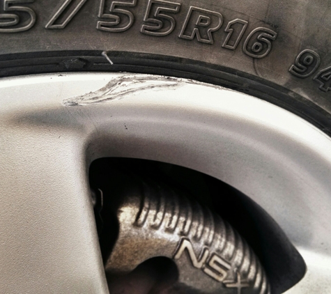 Chappell's Tires. Wheel damage caused by installation.