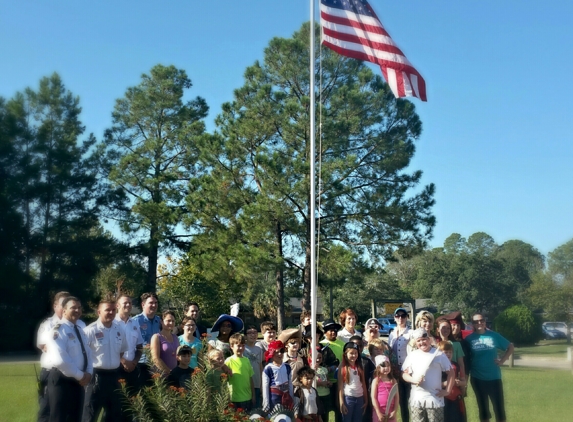 Home School Cottage - Slidell, LA. New Flagpole! Thanks to Perry Matherne from 'Modern Woodmen' for donating the Flagpole and to the Slidell Firemen for helping to dedicate it