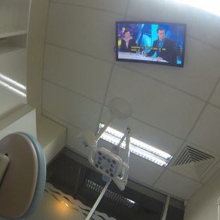 Dentist For Chickens - Swansea Dental Care - Blacksmiths, NSW