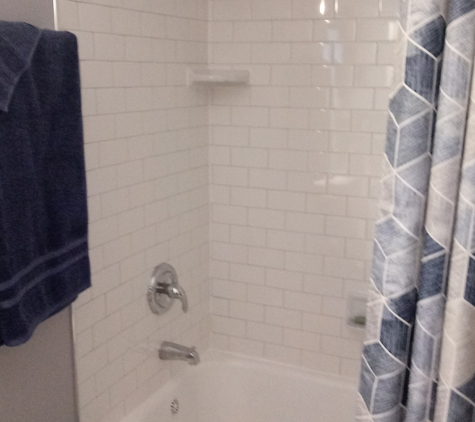 Brian's Home Improvement - Elmhurst, IL. Retiled shower/tub & new fixtures