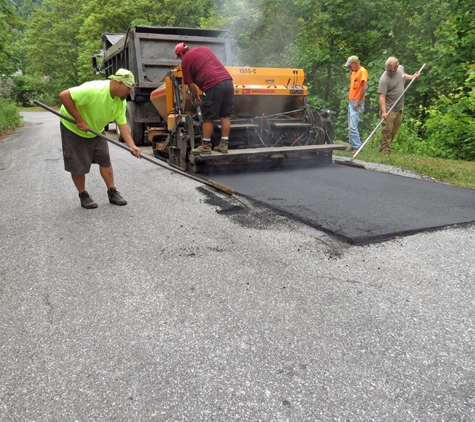 Pisgah Asphalt, Inc. - Etowah, NC. Hot mix dumped into paver