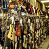 Bizarre Guitar and Guns gallery