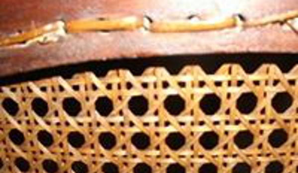 Chair Caning By Anne - Durham, NC. What a hole cane looks like from bottom,  as opposed  to press cane, which has no holes or weaving knots.