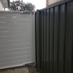 All Around Fencing - Gerringong, NSW. Custom timber slat gate and Aussie steel, Colorbond.