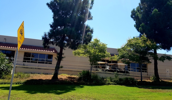 Saddleback Golf Cars - Laguna Woods, CA. Ouside with only some old carts available for sal