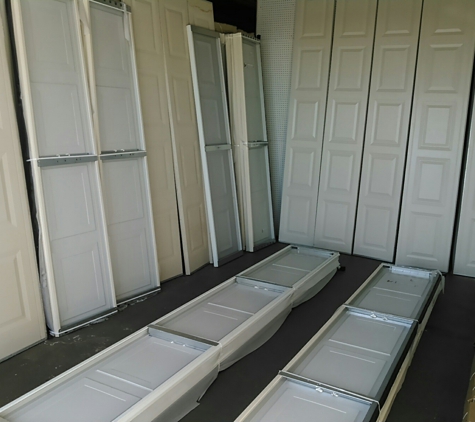 Spectrum Overhead Door- DISCOUNT CO.. New garage doors, and panels