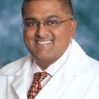 John, Gerald B., MD