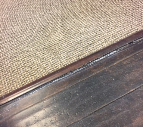 Wrigleys Carpet Care - Palmdale, CA. so much left over dried detergent. See white powdery residue left on the wood floor/carpet transitions.