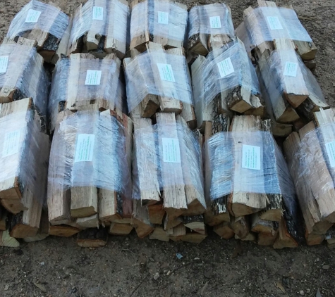 Hickmon's Wood Yard - Coldspring, TX. Bundle firewood. 10 sticks per bundle.