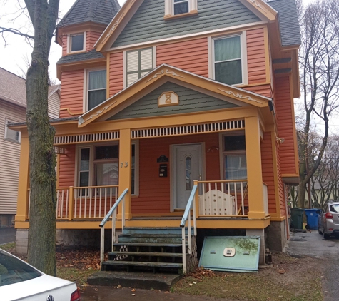 Laings Painting And Carpentry - Rochester, NY. Finished Exterior Paint job and building the concrete block