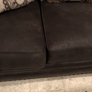 Gallery Furniture - Houston, TX. Seat cushion issue in other end of couch.