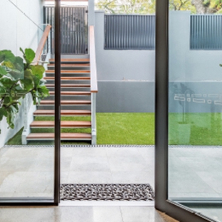 Bradnam's Windows & Doors - Urraween, QLD. Black Aluminium Hinged Door
