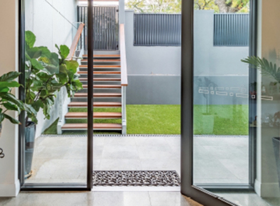Bradnam's Windows & Doors - Bungalow, QLD. Black Aluminium Hinged Door