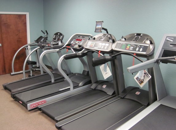 Exercise Systems Inc - Orlando, FL. Showroom Treadmills