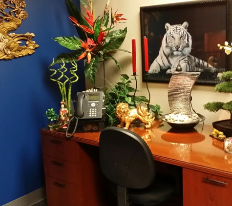 Eye Tie It Together Interior Decorating & ReDesigns - Jonesboro, GA. Asian-Inspired office using a water fountain as a calming element.