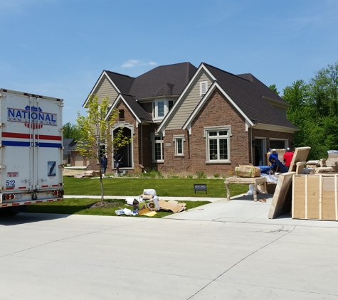 Professional Men Moving. Unloading